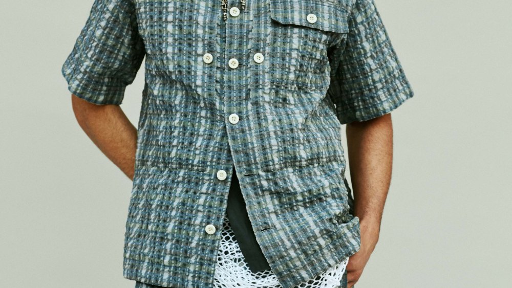Sacai’s polyester and cotton shirt and pants and cotton tank. Praise of Poison necklaces.