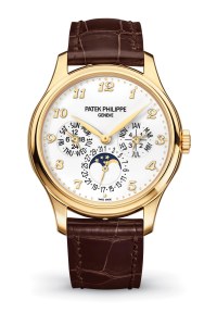 The men’s Perpetual Calendar in yellow gold with ivory lacquered dial and shiny alligator strap.