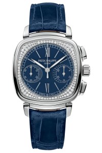 Patek Philippe’s ladies First Chronograph in white gold with opaline dial and alligator strap.