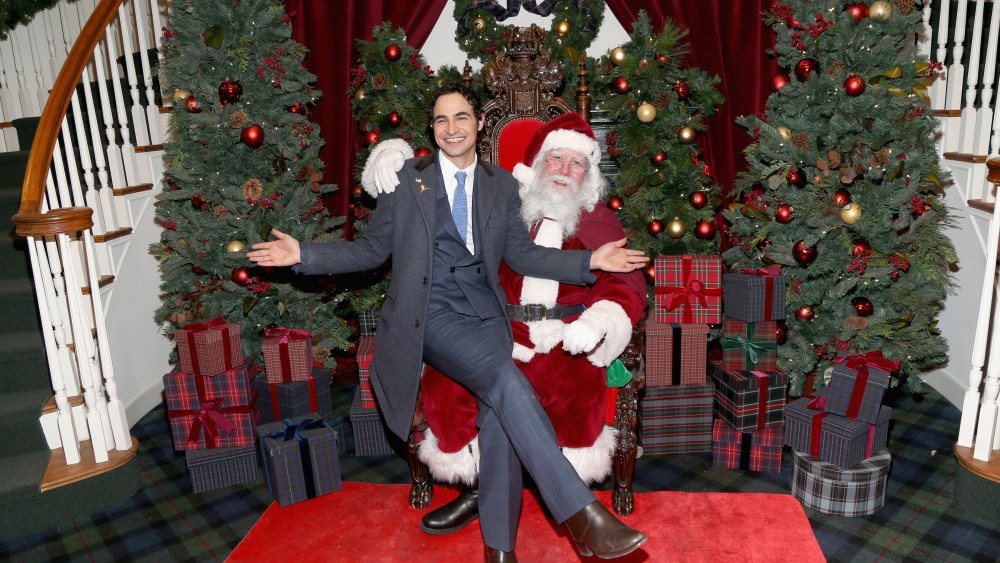 Zac Posen visits Santa during the Brooks Brothers event