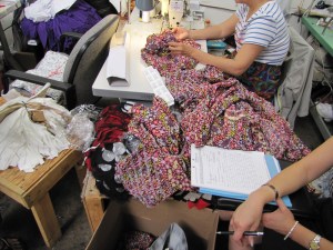 Labor Department officials check the records of a garment factory in Southern California.