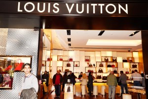 The Louis Vuitton shop at Macy's was filled with last-minute shoppers.