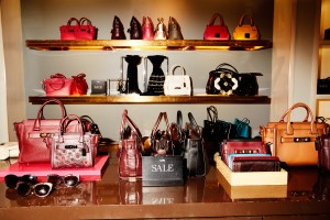 A sale display at Coach.