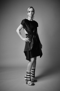 Christina Ricci in Fendi’s dress and boots; Mizuki earrings.