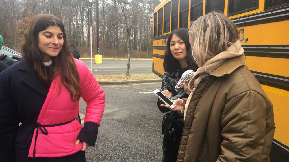 Designer Maryam Nassir Zadeh and two staff members arrive off the school bus in Landover, Maryland
