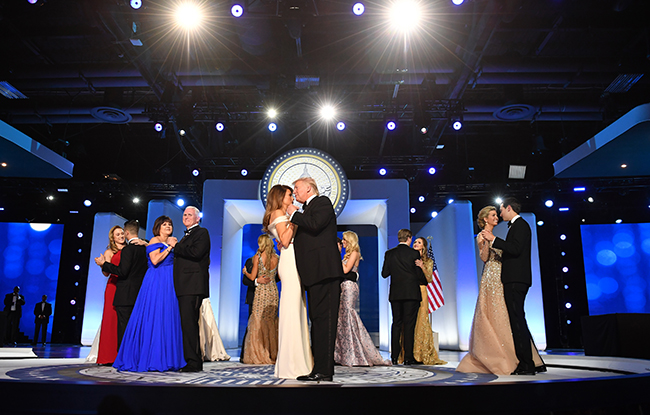 President Donald Trump and First Lady Melania Trump dance along with family members and Vice President Mike Pence and his wife Karen Pence Inaugural Ball Fashion Gallery