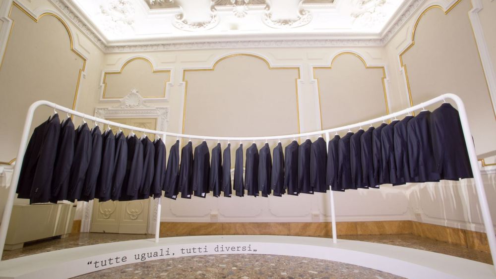 Kiton jackets ready to try on in the exhibition honoring Ciro Paone.