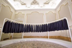 Kiton jackets ready to try on in the exhibition honoring Ciro Paone.