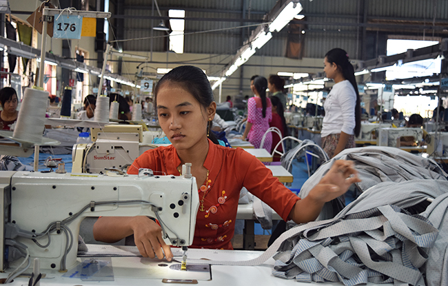 Workers sew garments in Myanmar.