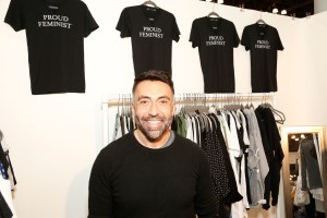 John Eshaya with his Jet by John Eshaya statement T-shirts.