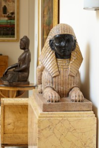 A pair of Egyptian style mixed marble sculptures.