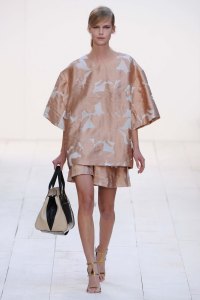 A model on the runway at Chloe's spring 2013 show in jardin des Tuileries at Espace Ephemere Tuileries.