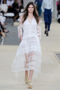 A model on the runway at Chloe's spring 2014 show at Lycee Carnot.