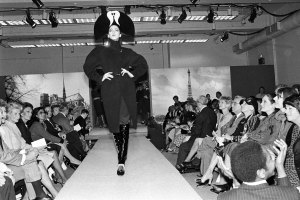 Lagerfeld's ultra-shaped redingote and evolutionary velvet Venetian fan hat at the Chloe Benefit Fashion Show at Christies, 1979.