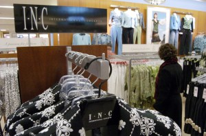 FEDERATED MAY A customer browses through I-N-C clothing, a store-label brand, at a Lazarus-Macy's store, in Cincinnati. Federated Department Stores Inc., which owns Lazarus-Macy's, hopes that its merger with May Department Stores Inc. will boost sales of private-label clothing brandsFEDERATED MAY, CINCINNATI, USA