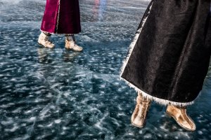 Mongolian women wearing reindeer fur boots stand on the ice at the Lake Khovsgol Ice Festival in Khatgal, Mongolia, on March 3, 2017.