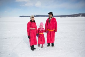 A family stands for a portrait at the Lake Khovsgol Ice Festival in Khatgal, Mongolia, on March 3, 2017.