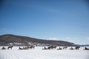 Mongolian men race sleighs at the Lake Khovsgol Ice Festival in Khatgal, Mongolia, on March 4, 2017.