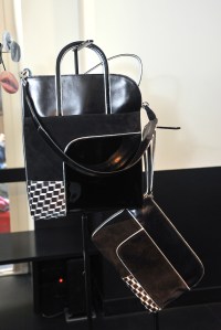 Playing around with the retro idea of coordinating one’s bag and shoes, Hardy embellished his leather goods collection with carved cutouts.