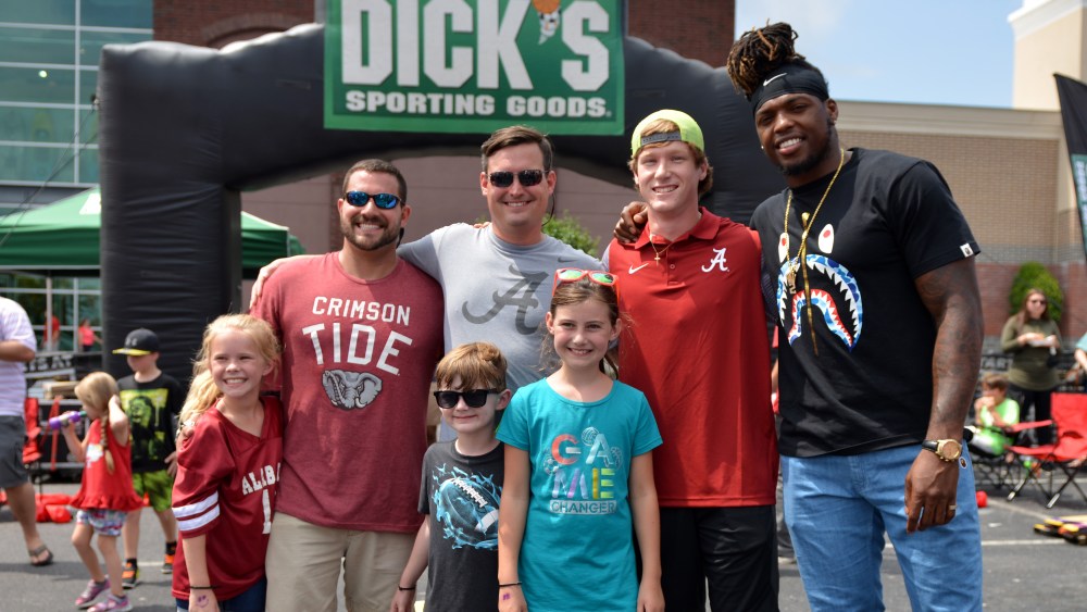 Copyright 2016 The Associated Press. All rights reserved. This material may not be published, broadcast, rewritten or redistributed without permission.Mandatory Credit: Photo by Andrea Mabry/AP/REX/Shutterstock (5891315c)Derrick Henry poses with the winners of the DICK'S Sporting Goods' bean bag toss tournament at its "Tailgate Divided" event, in Hoover, Ala'Tailgate Divided' event, Hoover, Hoover, USA - 03 Sep 2016