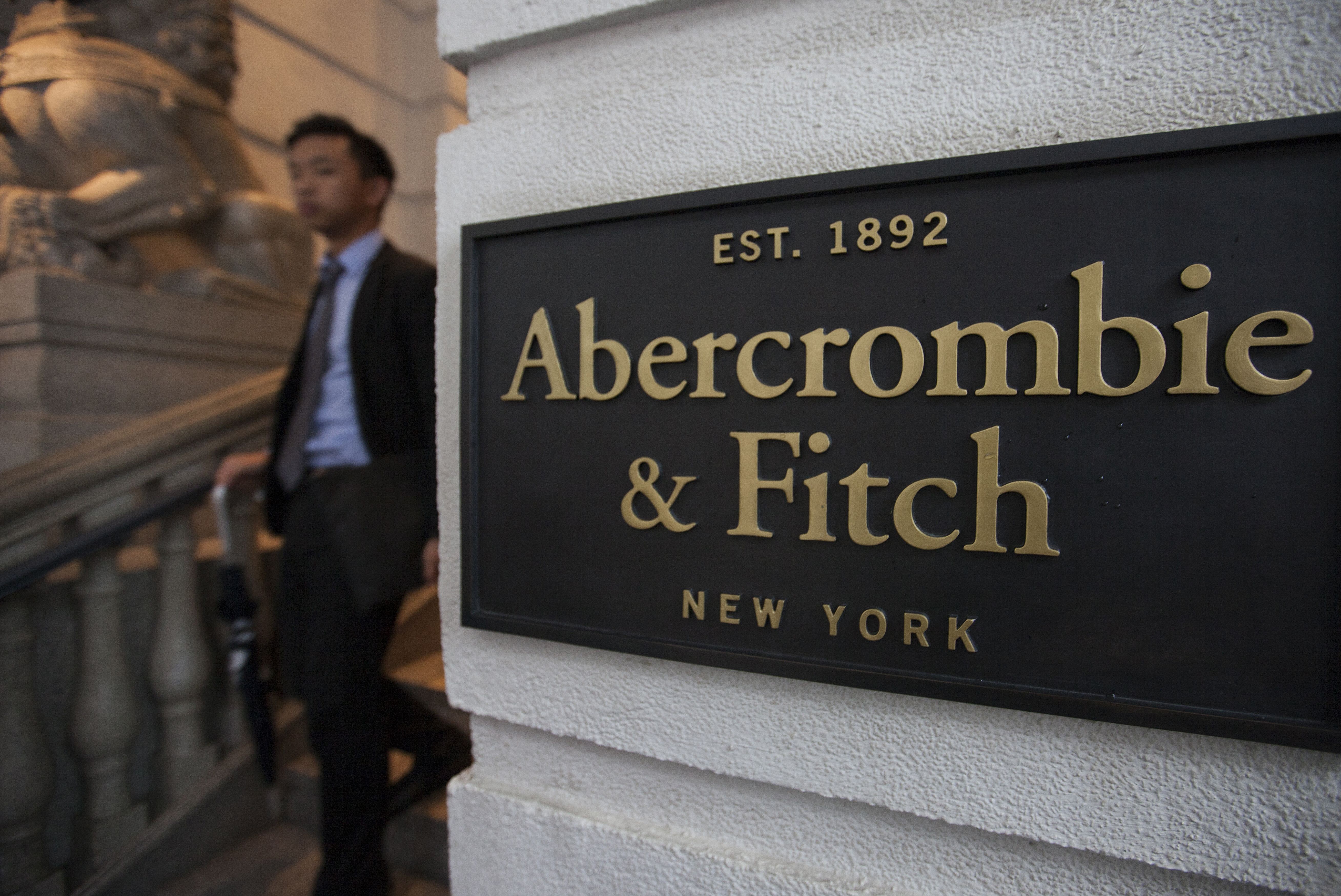 A Man Leaves the Hong Kong Flagship Store of Abercrombie & Fitch in Central District in Hong Kong China 23 November 2016 the Store Announced on 18 November 2016 That It Will Close Down in 2017 Two Years Before the End of Its Lease As It Can No Longer Afford to Pay the 7 000 000 Hong Kong Dollar (848 510 Euro) Per Month Rent - a Rent That is Reportedly More Than Double what the Previous Tenant in the Same Store was Paying in 2014 According to Reports Property Agents Said Rents For Street Level Stores in Hong Kong's Central Business District Have Dropped by 50 to 70 Percent From Their Peak in 2014 the Sharp Drop is Due to the Slowdown in the Number of Tourists From Mainland China Visiting the City For Luxury Shopping However Locals Are Optimistic That the Drop in Ground Floor Retail Rents Will Allow For Local Stores to Re-enter the Market Paying Lower Rents and Catering Towards the Needs of Hong Kong People by Selling Cheaper Goods and Services China Hong KongChina Hong Kong Property - Nov 2016