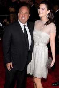 Billy and Katie Lee Joel'The Model as Muse: Embodying Fashion' Benefit Gala at the Metropolitan Museum of Art Costume Institute, New York, America - 04 May 2009Last night saw the glamorous and the glorious put on their glad rags and head down to one of the biggest events in the US fashion industry calendar ? the Met Costume Institute Gala.With a theme of ?Model As Muse?, the night was sponsored by Marc Jacobs who was the star guest of the evening and was accompanied by his main muse of the evening, Kate Moss.Although the number of tickets sold was down on last year, those that rebuffed the credit crunch were treated to a rich array of the most famously beautiful models in the world.Marc Jacobs dressed Kate Moss (a gold lame backless, one shouldered mini dress with a matching turban) and Victoria Beckham (a pink mini dress with black polka dots and a long train) while Louis Vuitton kitted out Madonna with a turquoise ruched mini dress with puffed skirt, thigh-high black boots, jewelled black fingerless gloves and a hair piece tied around a top knot to complete the odd 80s-inspired look.