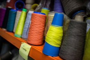 Cashmere thread sits on a shelf at Bodio's of Mongolia in Ulaanbaatar, Mongolia on March 15, 2017. Photographer: Taylor Weidman