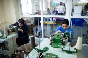 Workers sew garments at Sor Cashmere LLC.