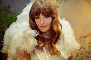 Helena Christensen, wearing one of the capes.