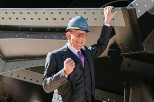Stephen Ross grips the Vessel.
