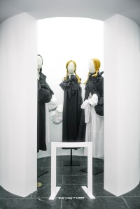 Three ensembles from the “Square,” autumn/winter 2003-04.