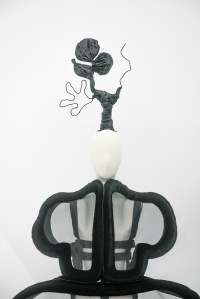 A closer look at one of the head pieces designed by Julien d’Ys with a dress from spring/summer 2014 “Not Making Clothes."