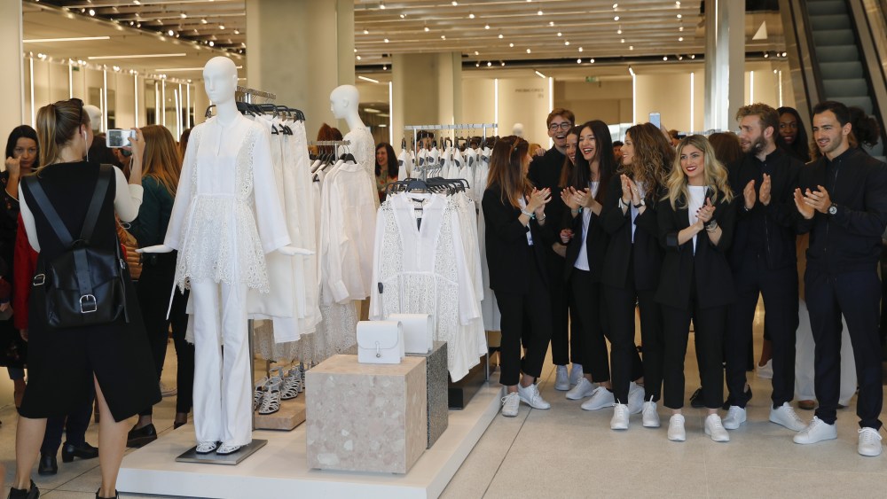 Zara staff applaud during the opening of the world's biggest Zara store in Madrid, Spain, 07 April 2017. The Spanish clothing retailer's store measures 6,000 square meters and is located in downtown Madrid.Zara opens its' biggest worldwide store in Madrid, Spain.