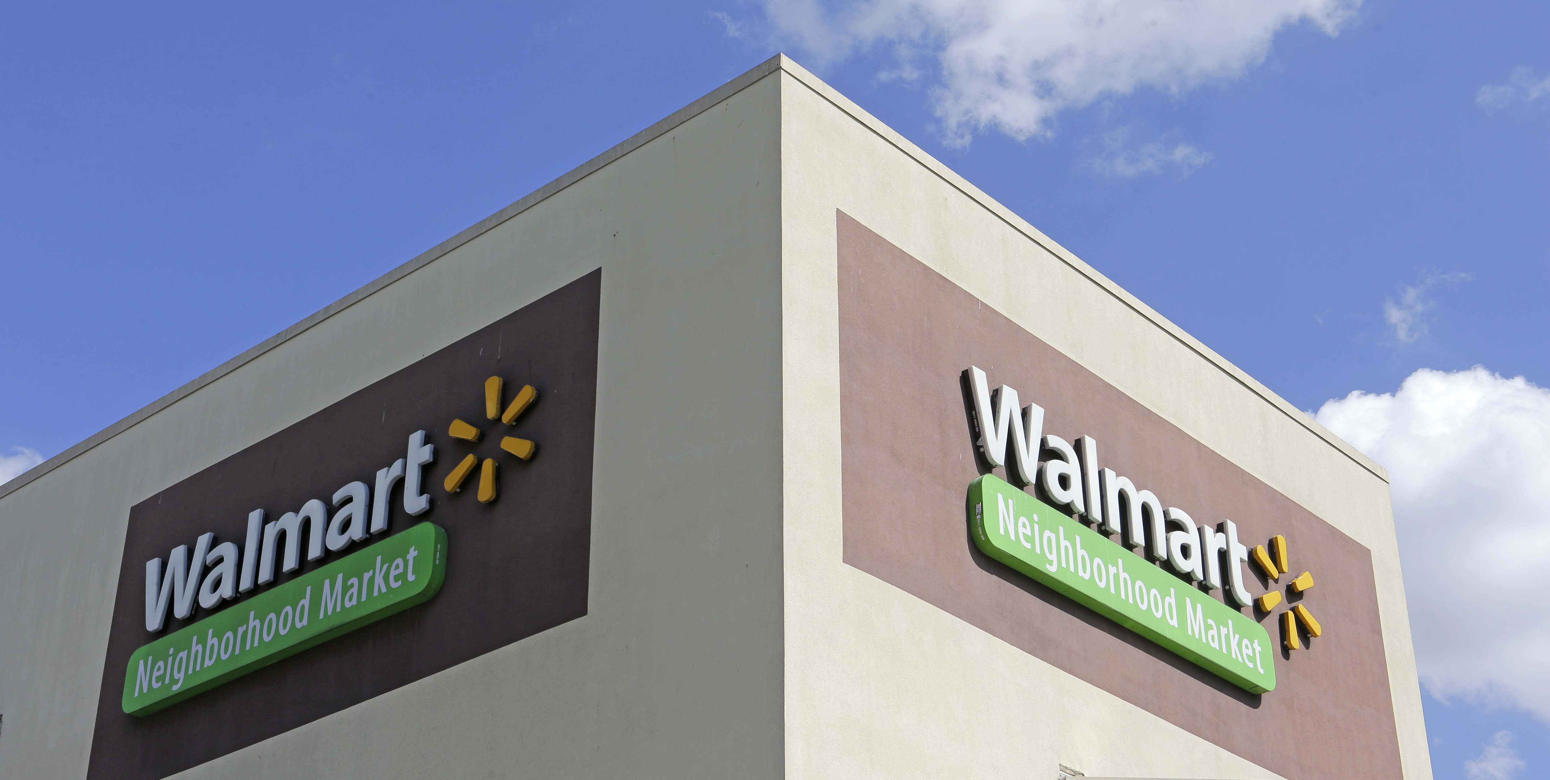 Copyright 2017 The Associated Press. All rights reserved. This material may not be published, broadcast, rewritten or redistributed without permission.Mandatory Credit: Photo by AP/REX/Shutterstock (8607154a)This, photo shows Wal-Mart signage at one of the company's neighborhood markets, in Hialeah, Fla. Starting April 19, 2017, Wal-Mart says it will offer discounts on thousands of online-only items when customers elect to have them shipped to one of the company's stores for pickupWal-Mart-Pickup-Discount, Hialeah, USA - 08 Feb 2017