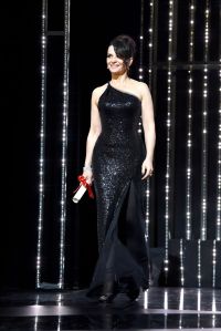 CANNES, FRANCE - MAY 28: Juliette Binoche walks onto the stage to present an award during the Closing Ceremony of the 70th annual Cannes Film Festival at Palais des Festivals on May 28, 2017 in Cannes, France.  (Photo by Pascal Le Segretain/Getty Images)