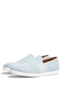 Bleach indigo slip-on sneakers.
