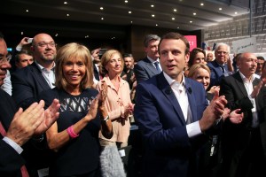 Copyright 2016 The Associated Press. All rights reserved. This material may not be published, broadcast, rewritten or redistributed without permission.Mandatory Credit: Photo by Thibault Camus/AP/REX/Shutterstock (5765149d)French Economy Minister Emmanuel Macron, right, and his wife Brigitte Trogneux, left, applaud during a political rally for his movement, En Marche! (Forward!), in Paris, Tuesday, July 12, 2016.En Marche political party rally, Paris, France - 12 Jul 2016