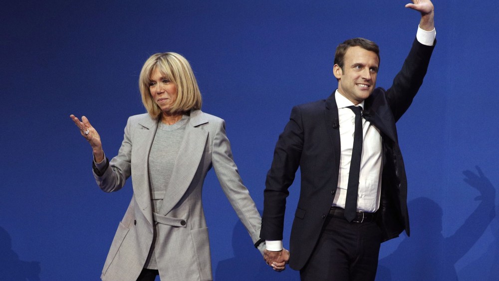 Emmanuel Macron and Brigitte TrogneuxFirst round of the French presidential elections 2017, Paris, France - 23 Apr 2017French presidential election candidate for the 'En Marche!' (Onwards!) political movement, Emmanuel Macron (R) celebrates with his wife Brigitte Trogneux (L) after the first round of the French presidential elections in Paris, France, 23 April 2017. Media reports that polling agencies projections place Macron and far-right Front National (FN) party candidate Marine Le-Pen in the lead positions for the vote. France will hold the second round of the presidential elections on 07 May 2017.