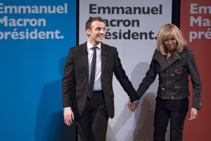 French presidential candidate Emmanuel Macron (L) of the 'En Marche' (Onwards or Forward) political movement holds hands with his wife Brigitte Trogneux (R) at a campaign event marking International Women's Day, at the Theatre Antoine in Paris, France, 08 March 2017. France holds the first round of the 2017 presidential elections on 23 April 2017.Emmanuel Macron international women's day rally, Paris, France - 08 Mar 2017