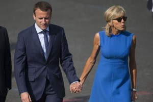 French Economy Minister Emmanuel Macron (l) and His Wife Brigitte Trogneux Arrive to Attend the Traditional Military Parade As Part of the Bastille Day Celebrations in Paris France 14 July 2015 the Bastille Day the French National Day is Held Annually on 14 July to Commemorate the Storming of the Bastille Fortress in 1789 France ParisFrance Bastille Day - Jul 2015