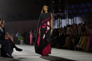 Naomi Campbell on the catwalk at the Fashion for Relief event in Cannes