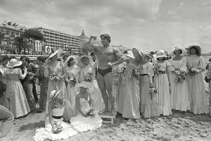 Arnold Schwarzenegger shows off his body for an appreciative beach audience in Cannes, France, ahead of the presentation of his film "Pumping Iron" at the Cannes Film Festival. The Cannes Film Festival officially gets underway on and as usual it's set to be one of the most dazzling events in the European entertainment calendar. The festival, in its 69th year, brings a mix of Hollywood A-listers and world cinema auteurs to the French RivieraCannes Glitz And Glamour, CANNES, France