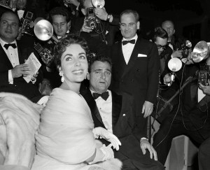 Elizabeth Taylor, Mike Todd U.S. film star Elizabeth Taylor and her husband, producer Mike Todd are surrounded by photographers at the Cannes Film Festival at Cannes, FranceCannes Taylor Todd, Cannes, France