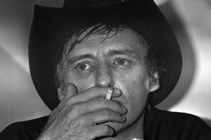 US actor and director Dennis Hopper smokes a cigarette at the film festival for the presentation of Canadian entry "Out of the Blue" in Cannes, France on . He refused to pose with actress Linda Manz because of an exclusivity contract with SYGMAFrance Cannes Film Festival Dennis Hopper, Cannes, France