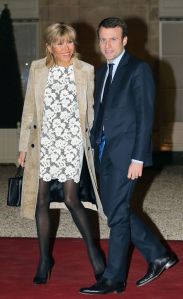 Emmanuel Macron, Brigitte Trogneux French Economy Minister Emmanuel Macron, right, and his wife Brigitte Trogneux arrive at the Elysee presidential palace in Paris to attend a state dinnerFrance Emmanuel Macron, PARIS, France