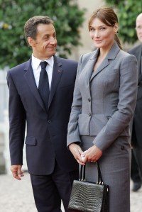 Nicolas Sarkozy, Carla Bruni-Sarkozy French President Nicolas Sarkozy, left, and his wife Carla Bruni-Sarkozy, look on as Pope Benedict XVI, unseen, leaves after their meeting at the Elysee Palace in Paris, . Pope Benedict XVI embarked Friday on his first visit to France as pontiff, urging French society to take Christian values into account despite the country's staunch, historic separation of church and stateFrance Pope, Paris, France