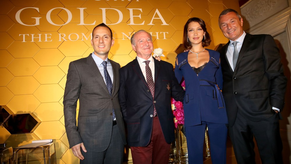 Bella Hadid with Bulgari perfume division's managing director Luis Miguel Gonzalez Sebastiani, the nose Alberto Morillas and Bulgari Group's chief executive officer Jean-Christophe Babin.