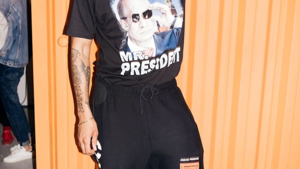 Heron Preston in a T-shirt depicting Vladimir Putin.