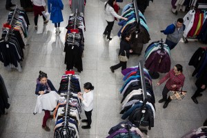 Customers shop at the State Department Store in Ulaanbaatar, Mongolia on March 19, 2017. Photographer: Taylor Weidman
