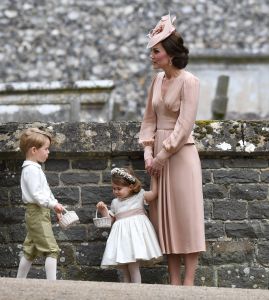 Duchess of Cambridge (in Alexander McQueen), Prince George and Princess Charlotte (Pepa & Co.) at the wedding of James Matthews and Pippa Middleton